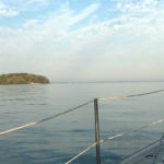 That morning proved to have almost no wind so I motored around the west side of Kelleys to dock at a marina in town. In the distance here, you can see Perry's Monument on South Bass Island.