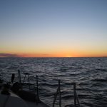 9/12/16 – Just before sunrise. My night was a good one. I was about 8 miles NNW of Geneva and the wind totally died. I was alone and far from any shipping channels. I turned on my anchor light, dropped anchor, and had a Bourbon in the cockpit while looking at the stars. It was a nearly full moon but the Milky Way was still bright and I spotted 7 shooting stars as well as the International Space Station. I slept there from about 11 pm until 3 am when I was awakened by some waves that told me that a little wind had returned. I started sailing again.