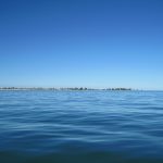 Long Point is a sand spit that juts out from Ontario about 40 kilometers (25 miles) into Lake Erie. It’s a site of hundreds of shipwrecks. On this day, a shipwreck was not much of a concern. Here I’m about a mile from shore and it’s about 140 feet deep. I slowly and carefully passed just east of the light and the depth got as shallow as 10 feet.