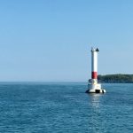 This is the Peche Island light - with Peche Island on the right. To the horizon on the left is Lake St. Clair.