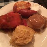 Kathleen's Polish Plate. Clockwise from top. Pierogi (with sour cream), sausage, mashed potatoes, sauerkraut, and stuffed cabbage.