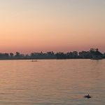 September 23, 2017 - Since this is technically a boat trip, Kathleen and I slept on the boat despite the heat. We actually had enough breeze that we had a pleasant night. The next morning, there were rowers out on the Detroit River. My picture also captured a fish jumping out of the water in the lower right corner.