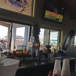 I had lunch at the Casino. (Just a bar - not actually a casino.) There's something particularly nice about seeing my boat from my seat at the bar. (Look past the teal green umbrella.)