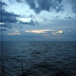 August 18, 2019 – Day 2. Wow, what a night. I got to experience my first significant thunderstorm while solo sailing. 30 knot winds and a lot of thunder and lightning but I was ready for it and it wasn’t too bad. It only lasted about 11 minutes for me. Later, I heard that Rod got hit much harder and was knocked down. But generally, it was a pleasant night. Comically, Lawrence sailed up from Cleveland and met the fleet. He saw several of the boats and I talked to him on VHF but I never spotted him.