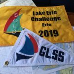 On the Wednesday after the challenge, there’s a luncheon in the club. All participants get up and give a speech about their experience or what they learned. Most mentioned Sunday night's storm. All new members get a GLSS burgee. Everyone who won an award got a flag. My yellow flag is for third place in my class. I would have rather had an afternoon talking to Ron Smallbone than to take his flag. But he’d had an exceedingly long sailing summer and after he lost his halyards within striking distance of the Welland Canal, I don’t blame him for heading back to Toronto. I’m proud of the flag and burgee anyway.
