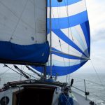 I haven't flown my spinnaker very often. It's a real Goldilocks kind of thing for me. But one time, sailing away from Toledo Beach was one of those days. It pulled nicely for over 5 hours until the wind shifted into a reach.