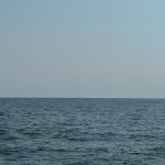 Looking behind me, Cleveland is about 20 miles back and is dropping off over the horizon. The wind finally dropped to the point where I was only making about two knots. I had a long way to go, so I needed to motorsail for several hours.