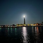 But the highlight of the night was the full moon. It came up and rose right over the monument.